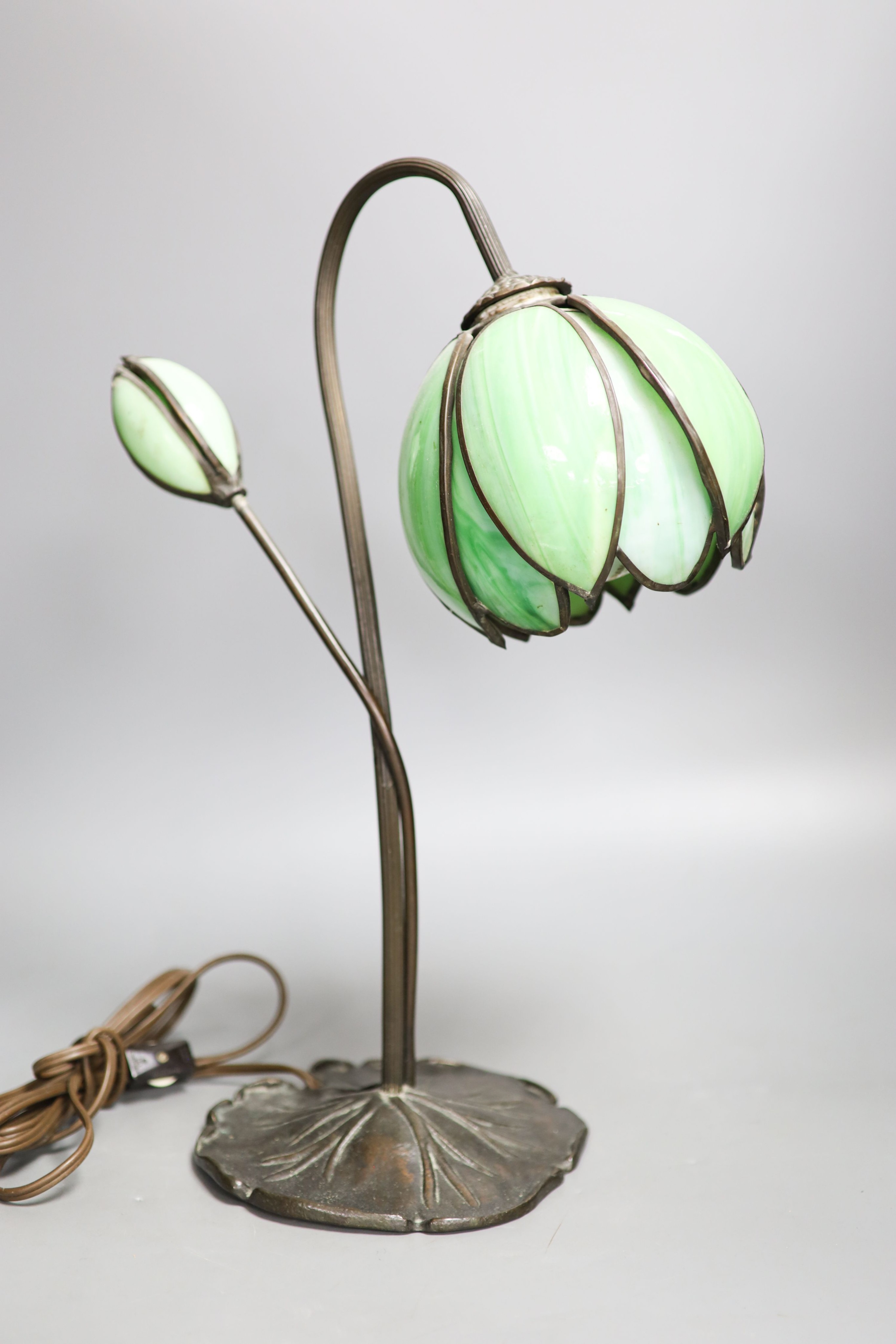 A Tiffany style metal and glass lamp 43cm